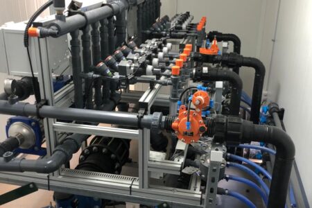 Industrial water filtration system with interconnected pipes and valves